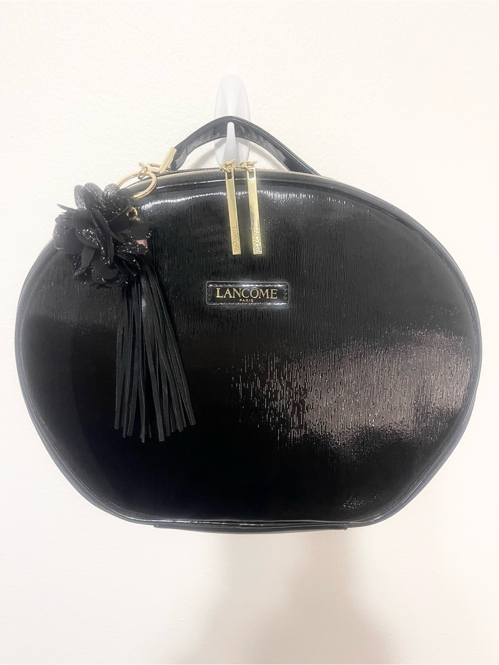 Lancome NWOT Black Patent Round Cosmetic Case with Tassel Charm